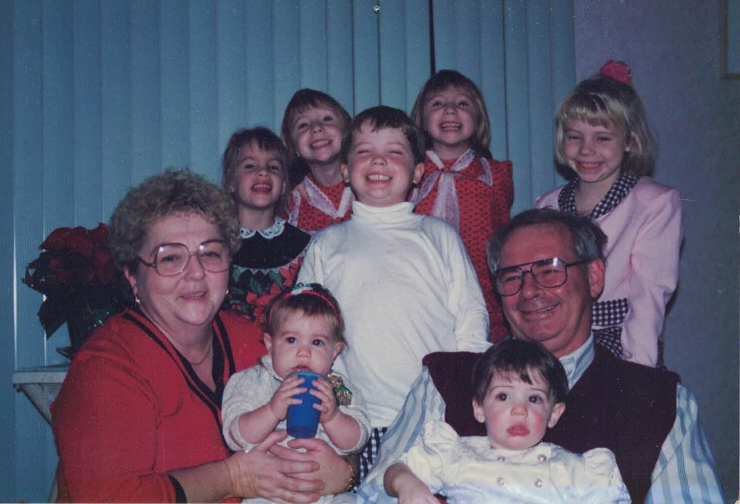A group of people are posing for a picture together.