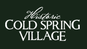 A logo for historic cold spring village on a green background