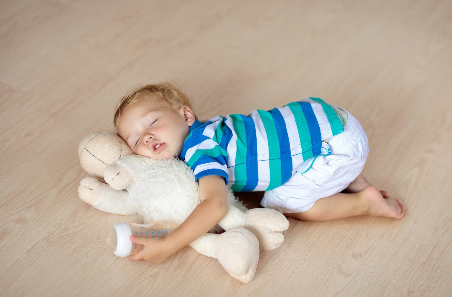 Luxury Vinyl Plank Floors — Kid Fell Asleep on Hardwood Flooring in Bellmawr, NJ Luxury Vinyl Plank Floors — Kid Fell Asleep on Hardwood Flooring in Bellmawr, NJ