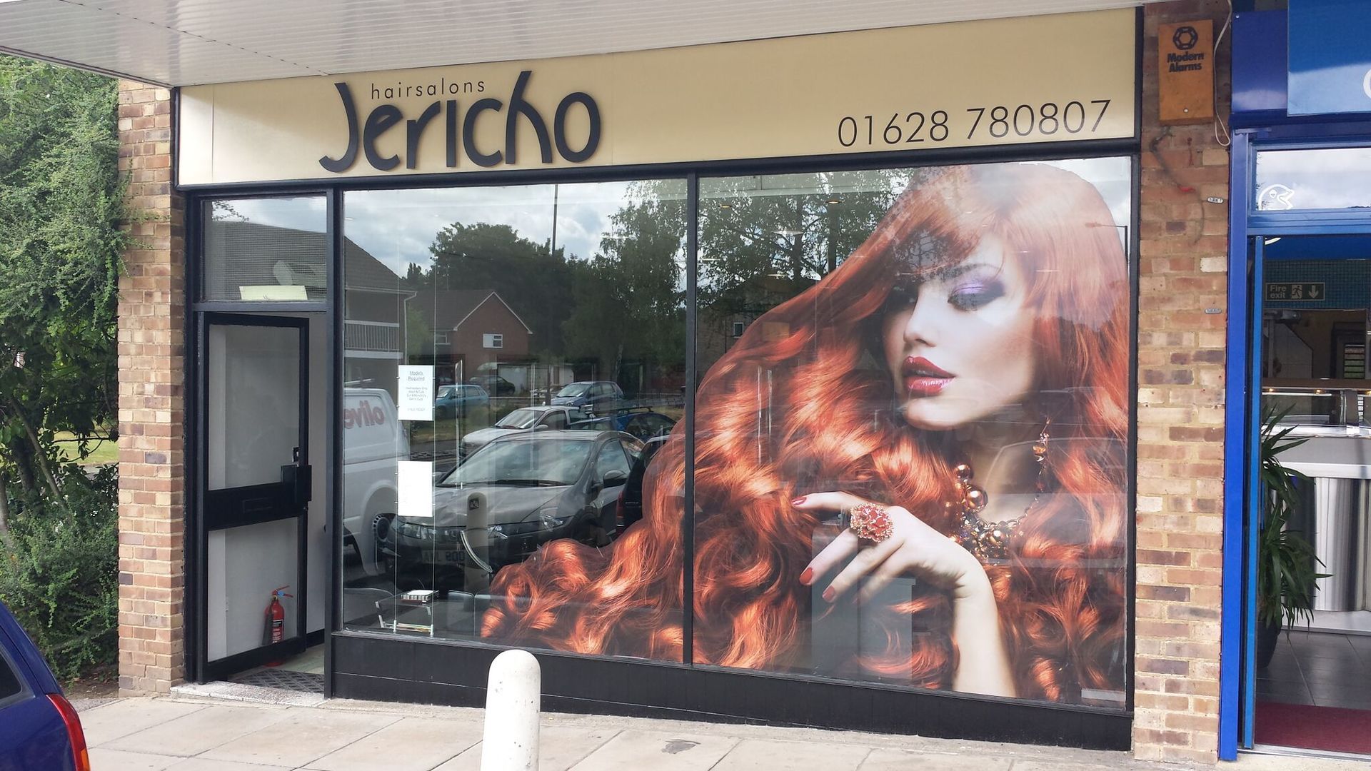 Window Graphics lady with long red hair.
