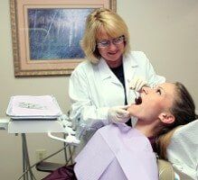 Woman Being Treated – Dental Practice in Whittier, CA Woman Being Treated – Dental Practice in Whittier, CA