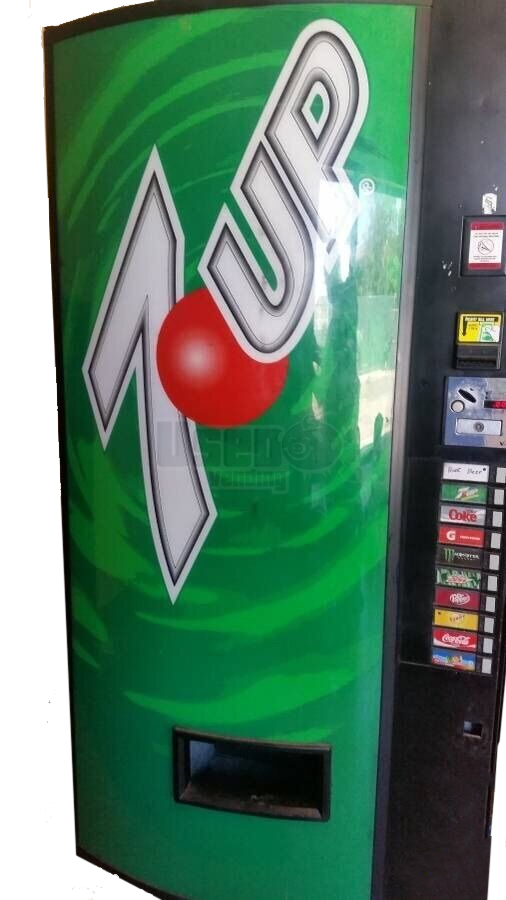 7up Stack Machine is a machine that has 7up products and holds them in a stack behind the front of the vending machine.