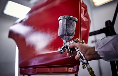 Custom Auto Paint — Modern Red Car in Newark, OH Custom Auto Paint — Modern Red Car in Newark, OH