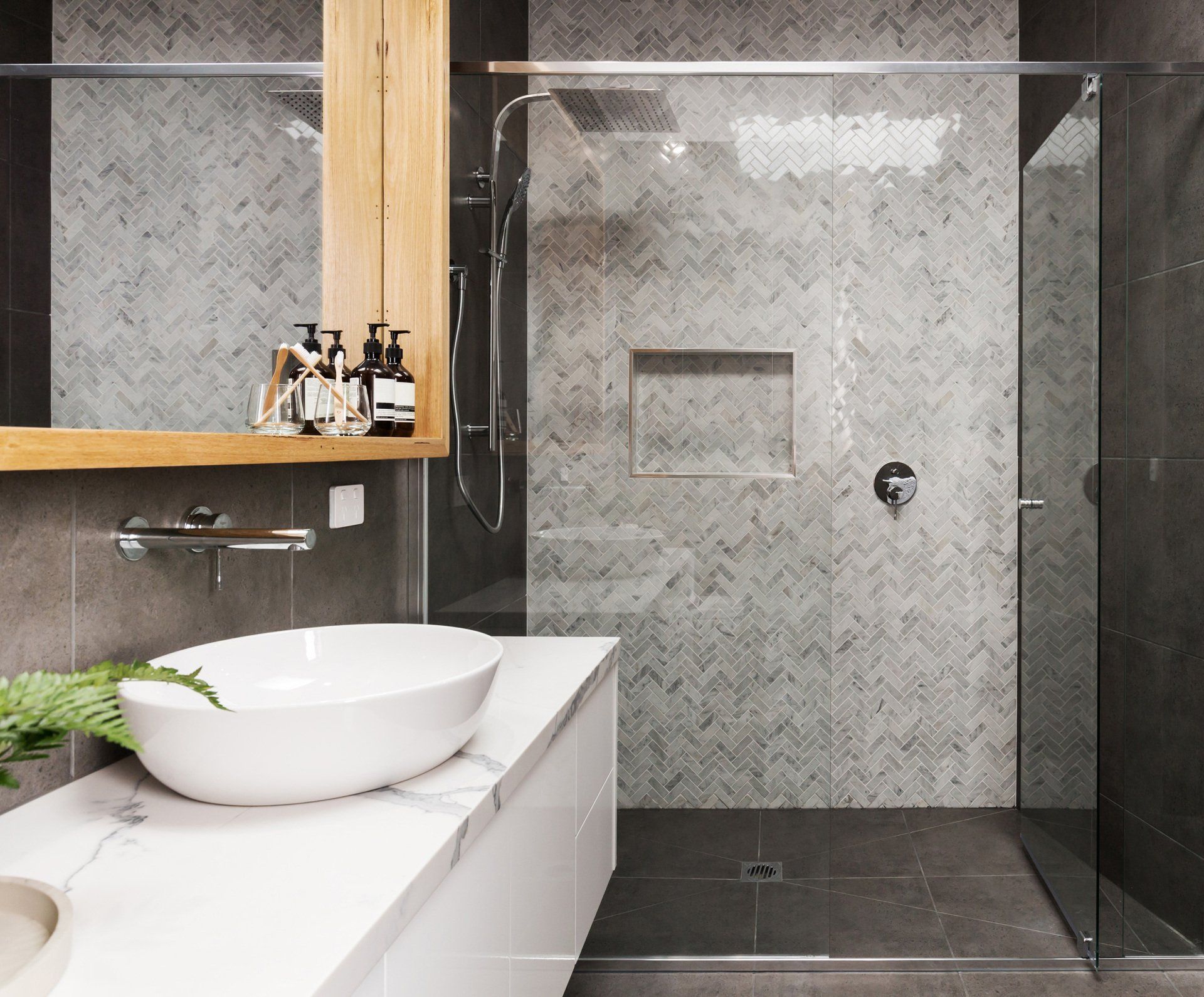 Bathroom With Marble Mosaic Herringbone Tiled Shower — Absolute Bathrooms & Renovations in Casino, NSW