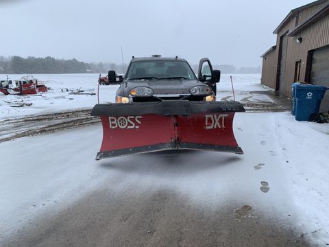 Car with a Snow Shover — Midland, MI — Maksymum Lawn and Landscaping Car with a Snow Shover — Midland, MI — Maksymum Lawn and Landscaping