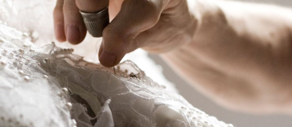 bridal dress being stitched