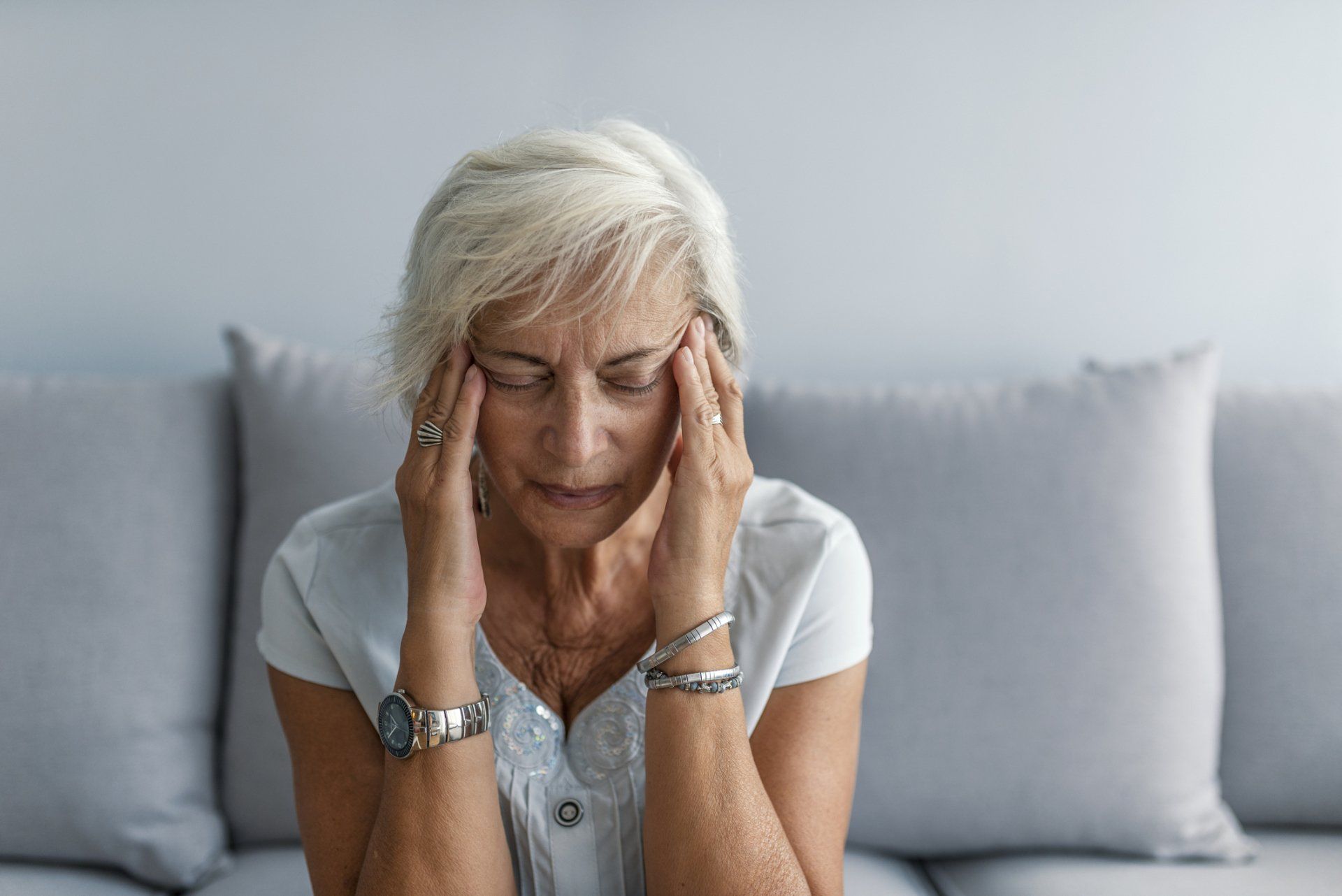 Neck Pain — Woman Having Headache Migraine in Beloit, WI