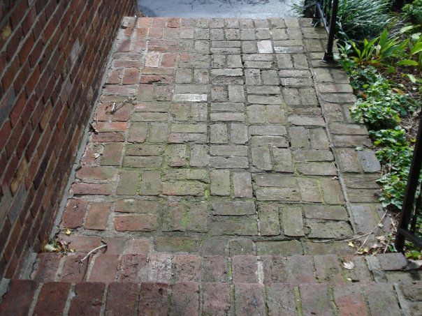 Pressure washing brick before