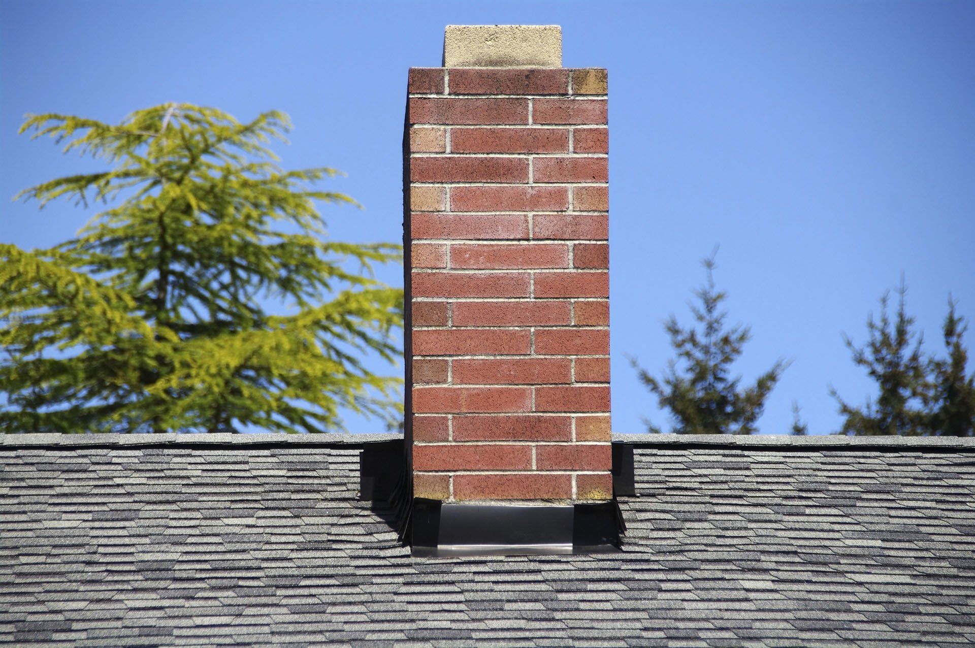 Brick Chimney On A Roof — Lawrenceville, GA — A Neat Sweep