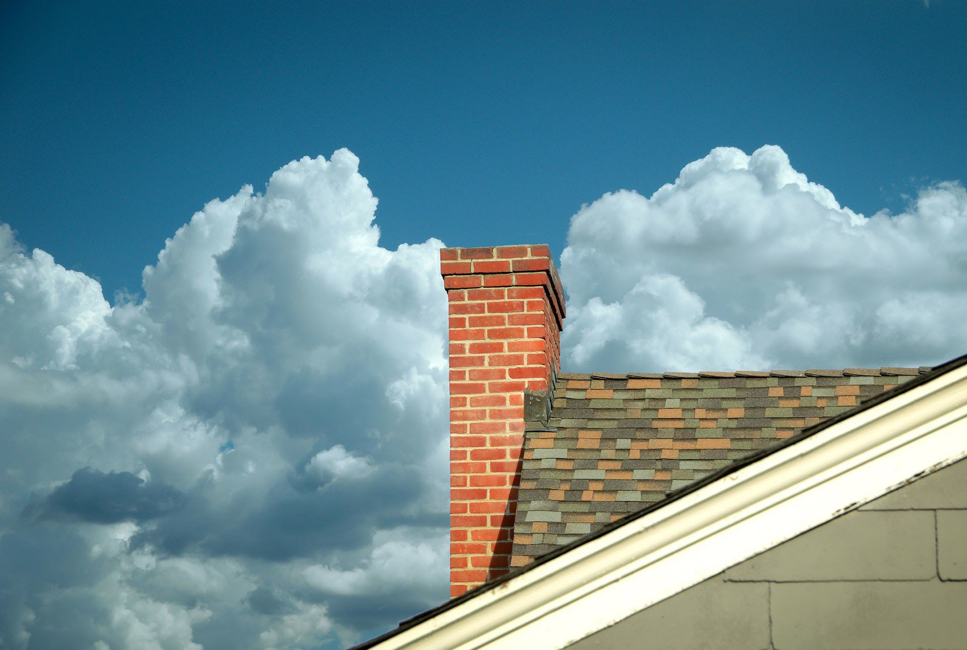 Tiled Roof With Chimney — Lawrenceville, GA — A Neat Sweep