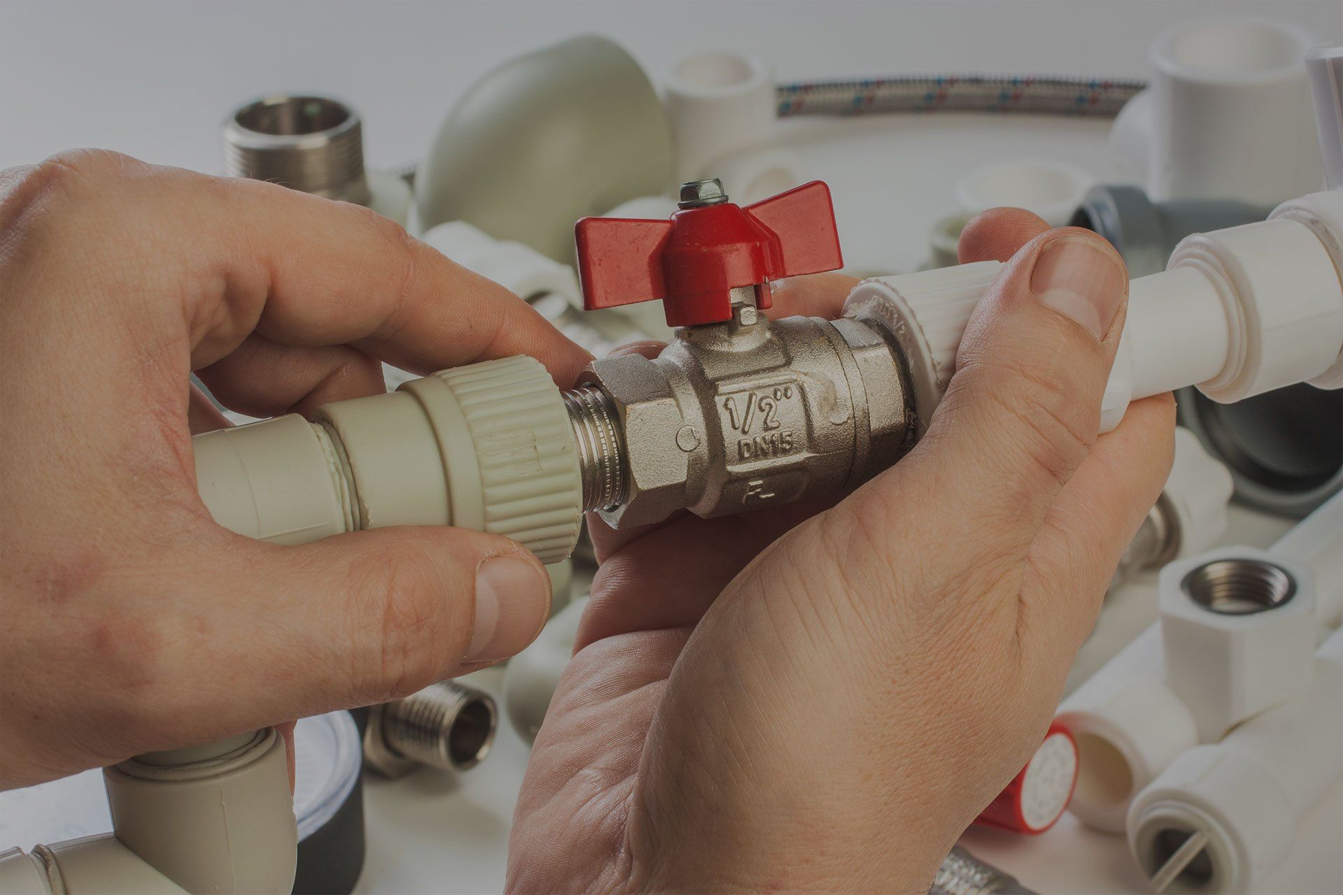 plumber attaching hoses