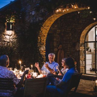 Friends enjoying dinner outside