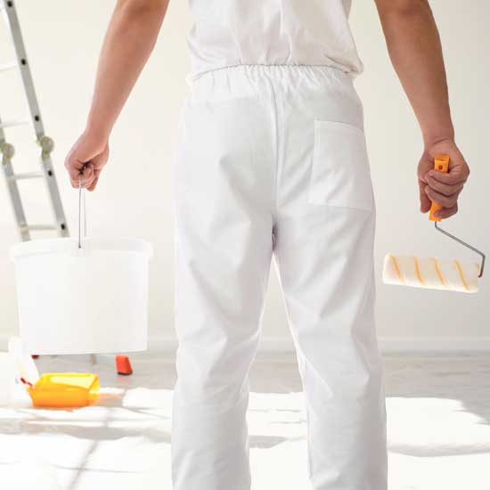 Painter with a roller works — D & K Sharpen in, NSW Painter with a roller works — D & K Sharpen in, NSW