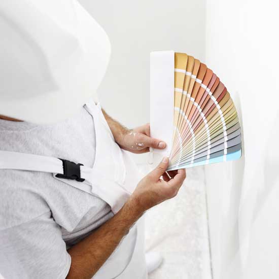 Painter man with color swatches — D & K Sharpen in, NSW Painter man with color swatches — D & K Sharpen in, NSW