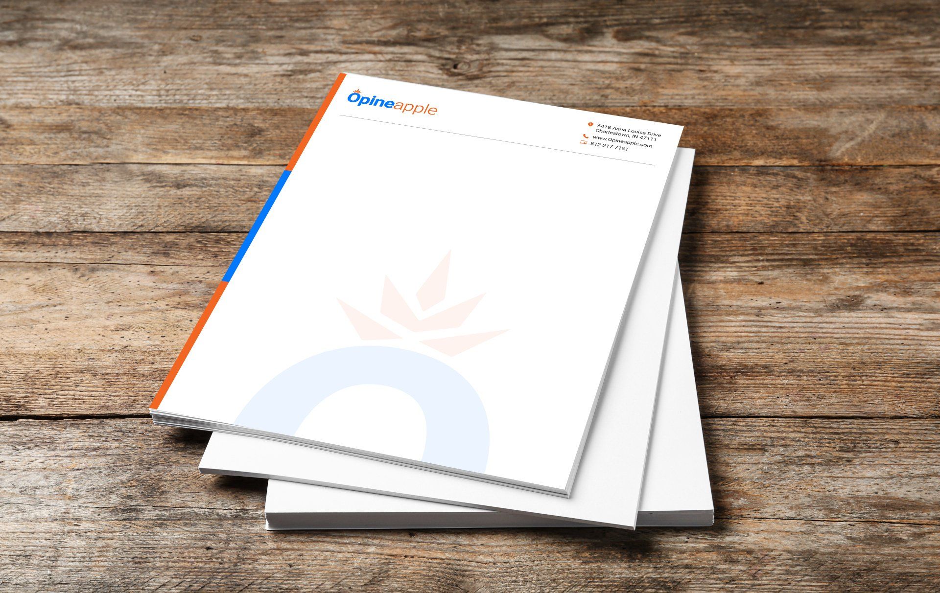A document with Opineapple letterhead on a table.