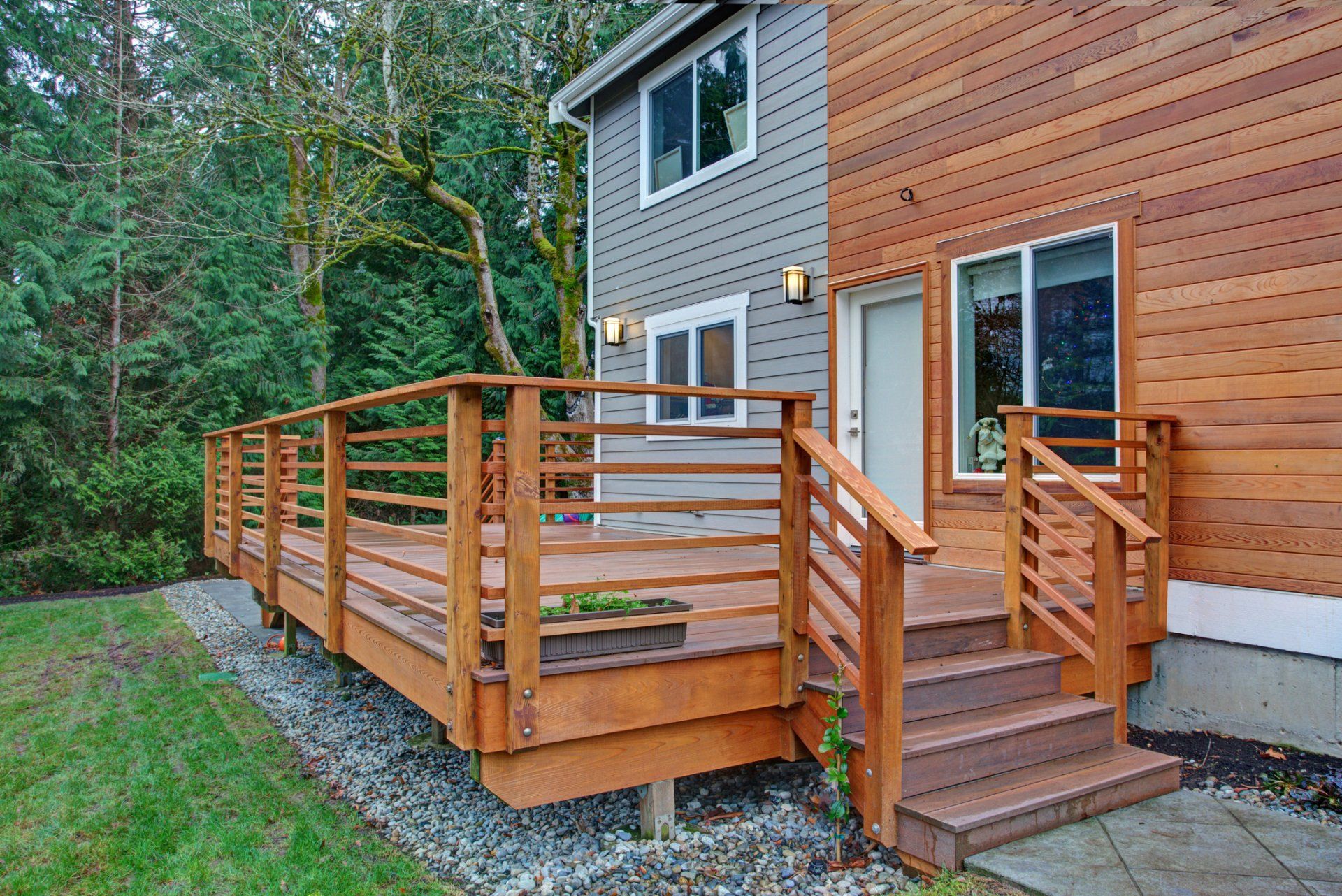 Wood Decks — Natural Wood Deck and Grey Siding in Clayton, NC