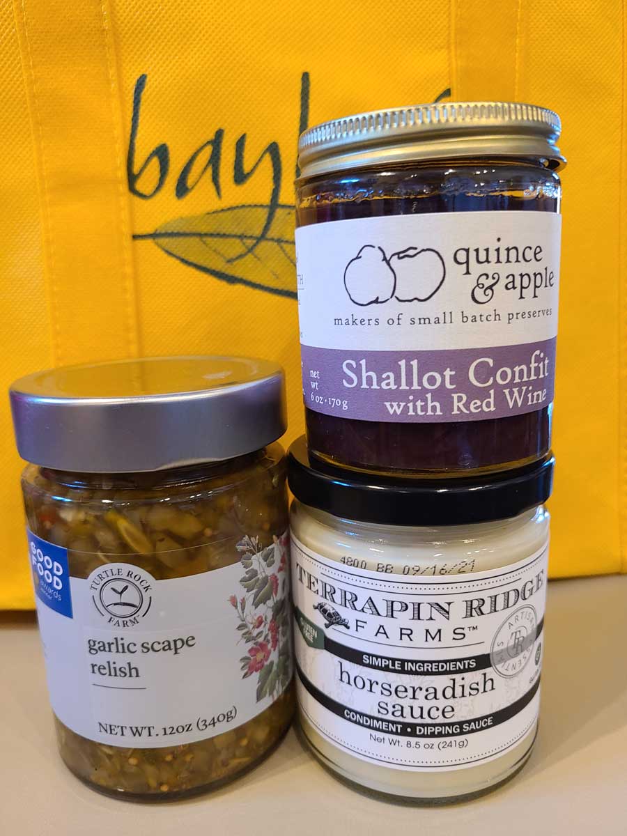 three jars of food are stacked on top of each other