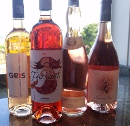 several bottles of wine including one called gris
