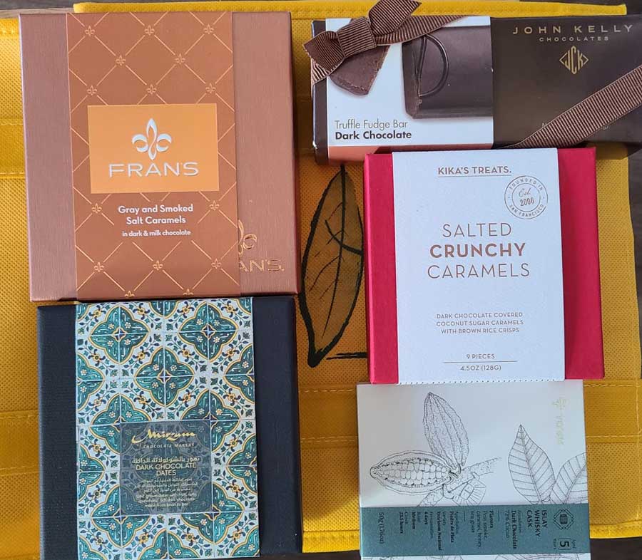 a box of salted crunchy caramels sits on a table