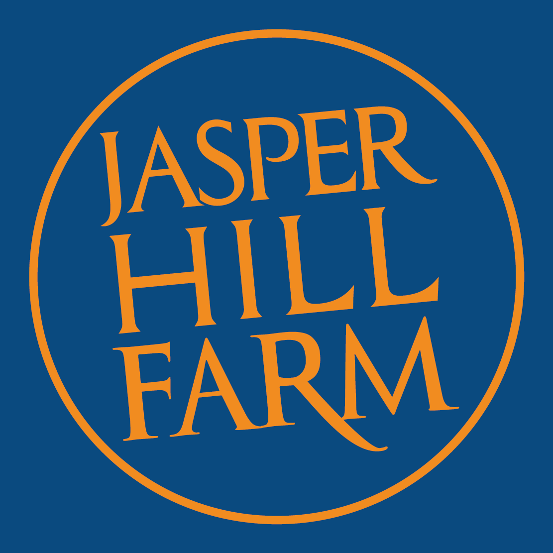 the logo for jasper hill farm is blue and orange