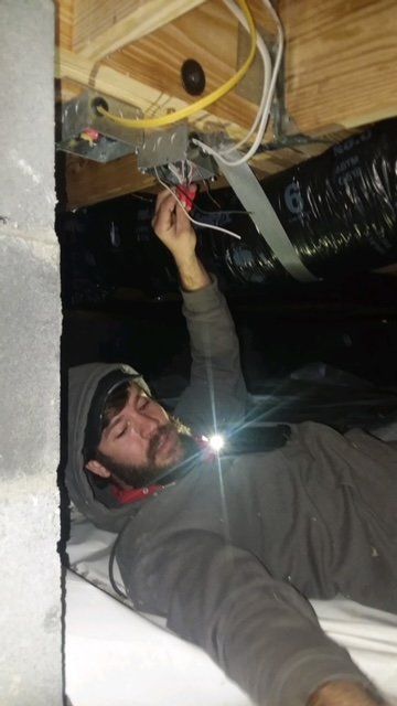 Installing Lamp to Ceiling — Jacksonville, NC — Onslow Electric Installing Lamp to Ceiling — Jacksonville, NC — Onslow Electric