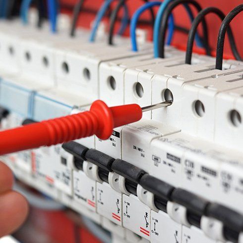 Multimeter Probe at Electrical Switchgear Cabinet — Jacksonville, NC — Onslow Electric Multimeter Probe at Electrical Switchgear Cabinet — Jacksonville, NC — Onslow Electric