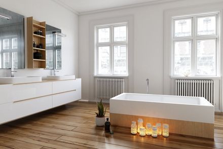 Bathroom with small bathtub near window