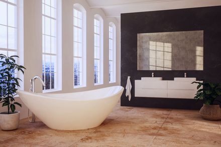 Bathroom Installation with Curved style bathtub near the window