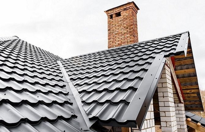 A newly installed black colour tile roof for a double storey residential home in Hobart, TAS