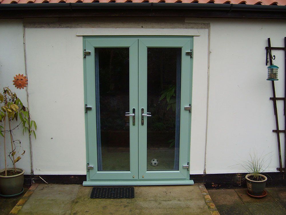 UPVC grained effect French doors in Chartwell Green – Badingham, Woodbridge, Suffolk