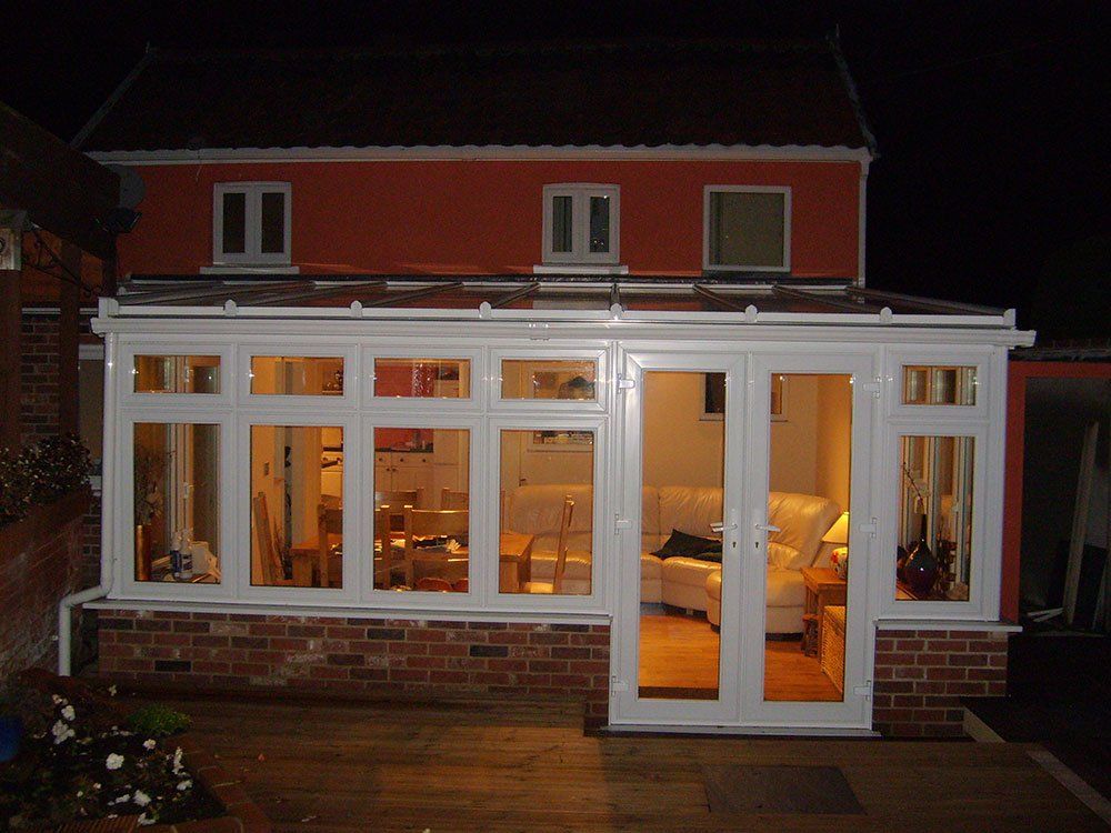 Lean-to UPVC conservatory with dwarf wall and even glass sight lines – Palgrave, Diss, Norfolk