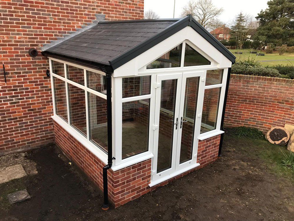 UPVC gable fronted conservatory with dwarf wall