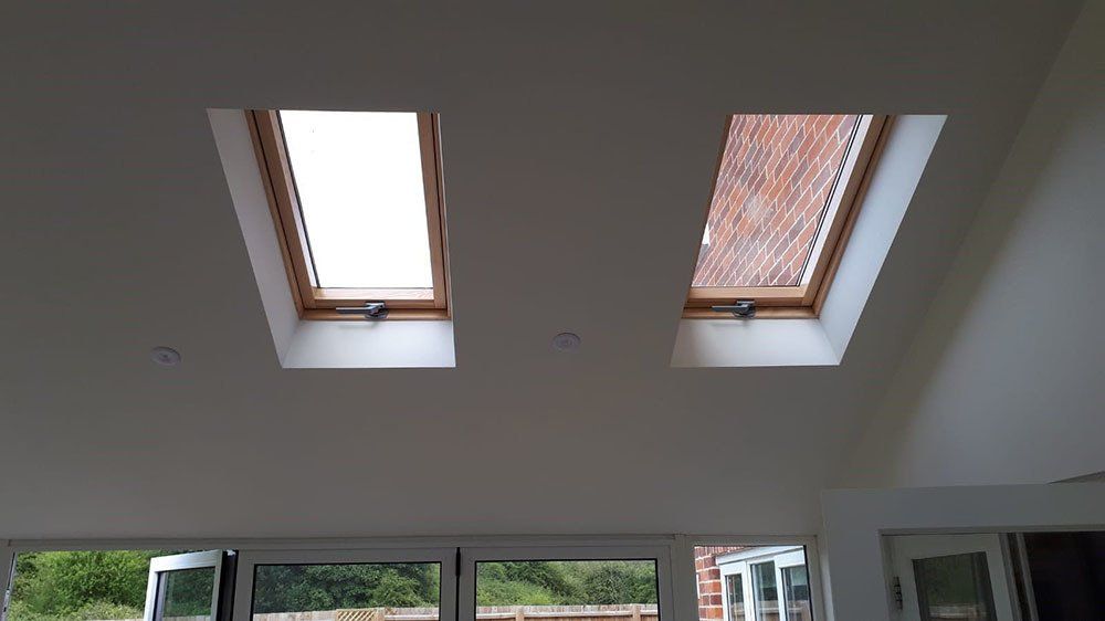 Internal view of UPVC Victorian conservatory with Guardian Warm Roof and slate effect tiles