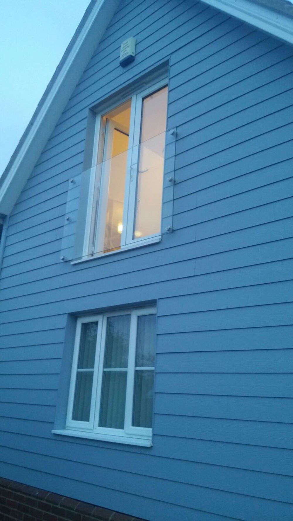 UPVC French door with Juliet balcony shown with cladded wall – Yoxford, Saxmundham, Suffolk