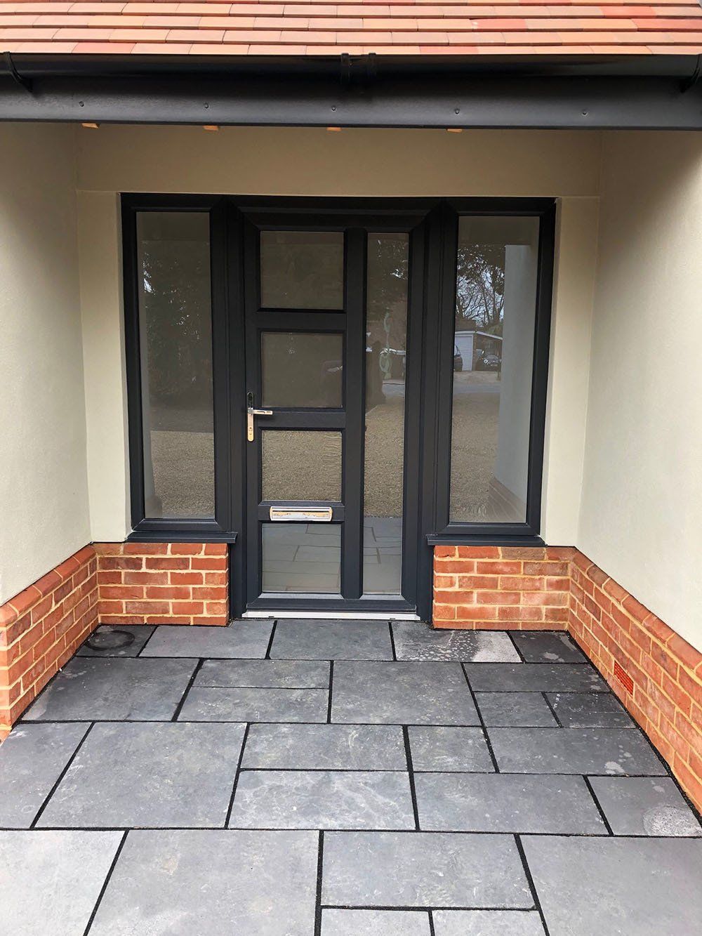 UPVC wood grained effect windows with a Brett Suffolk door and side screens – Halesworth, Suffolk