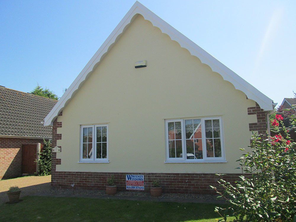 White UPVC with Georgian Cross windows and shaped bargeboard – Halesworth, Suffolk