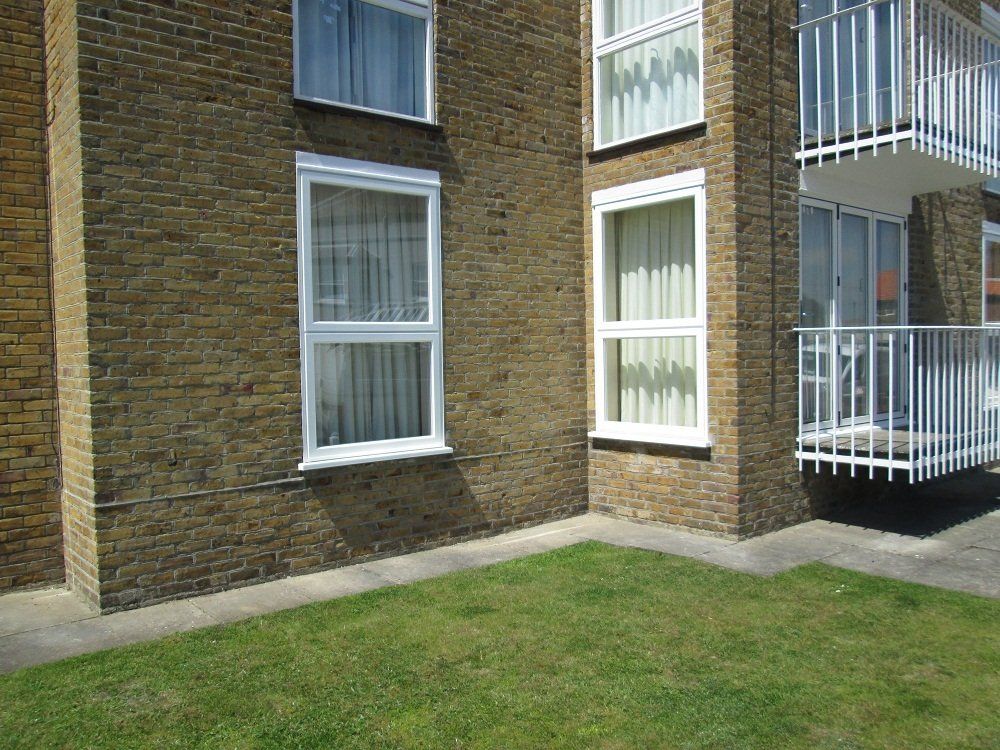White UPVC standard window project on block of flats – Aldeburgh, Suffolk
