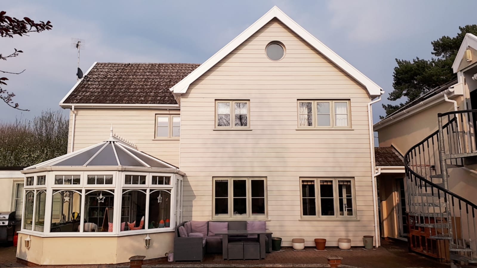 UPVC Evolution windows in Olive Grey, HardiePlank cladding – Norton, Bury St Edmunds