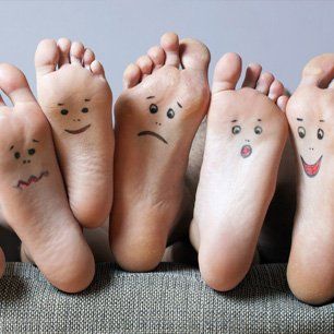 feet with different smiles