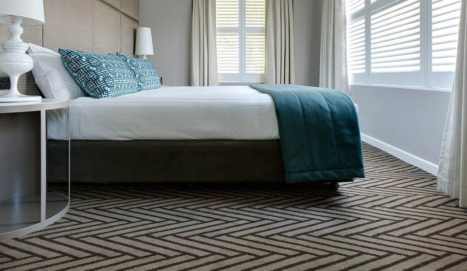 Carpet Tile in Bedroom — Carpet & Floor Installer in Garbutt, QLD Brown Vinyl — Carpet & Floor Installer in Garbutt, QLD Carpet Tile in Bedroom — Carpet & Floor Installer in Garbutt, QLD Brown Vinyl — Carpet & Floor Installer in Garbutt, QLD