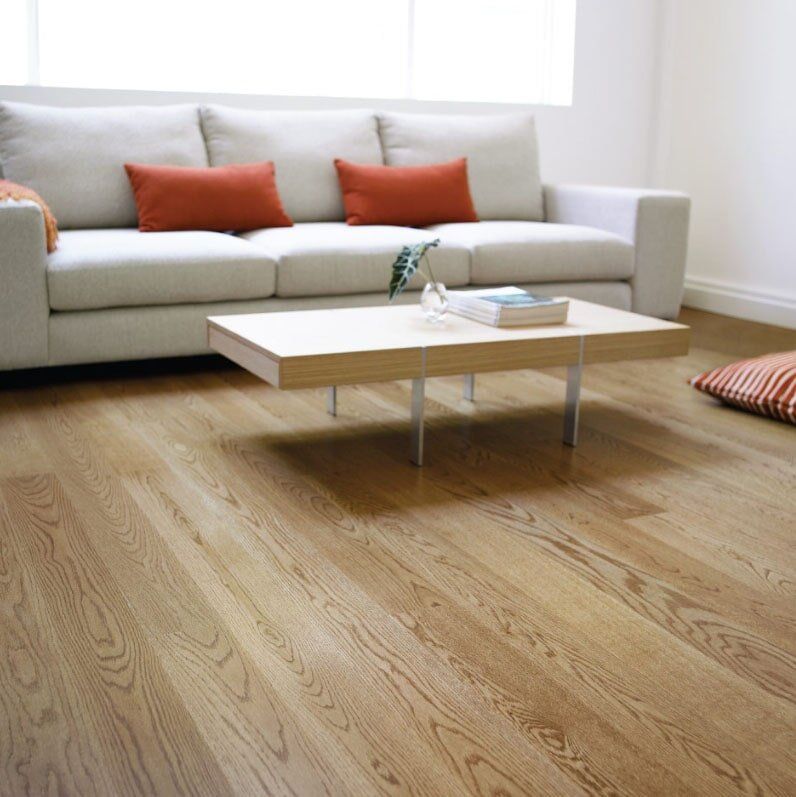 Floating Timber Floors — Carpet & Floor Installer in Garbutt, QLD Brown Vinyl — Carpet & Floor Installer in Garbutt, QLD
