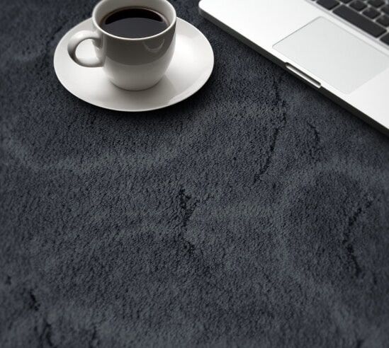 Black Carpet — Carpet & Floor Installer in Garbutt, QLD Brown Vinyl — Carpet & Floor Installer in Garbutt, QLD Black Carpet — Carpet & Floor Installer in Garbutt, QLD Brown Vinyl — Carpet & Floor Installer in Garbutt, QLD