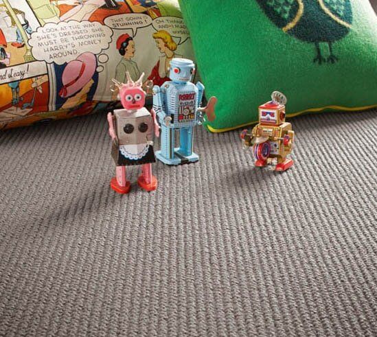 Carpet Tile in Playroom — Carpet & Floor Installer in Garbutt, QLD Brown Vinyl — Carpet & Floor Installer in Garbutt, QLD