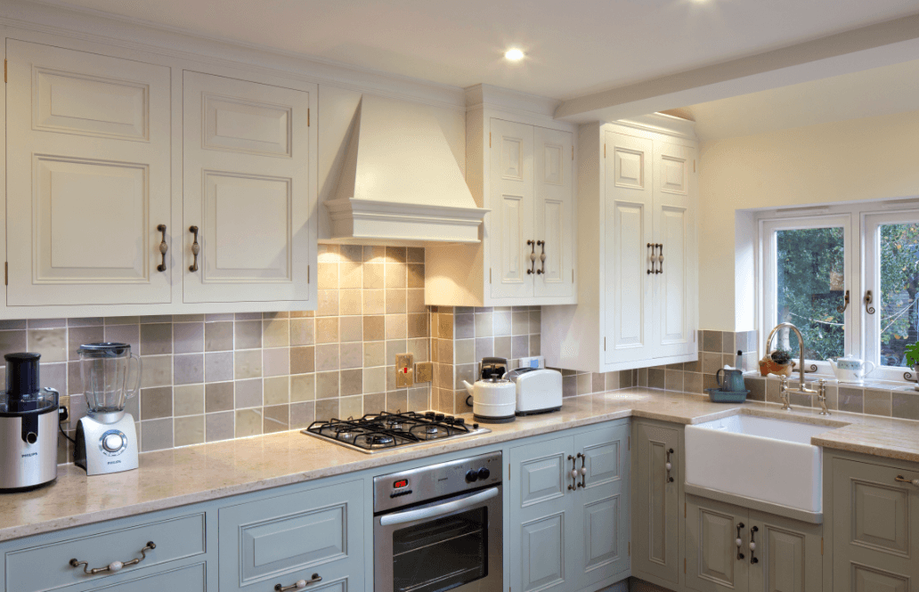 fully furnished kitchen with cabinets and equipment