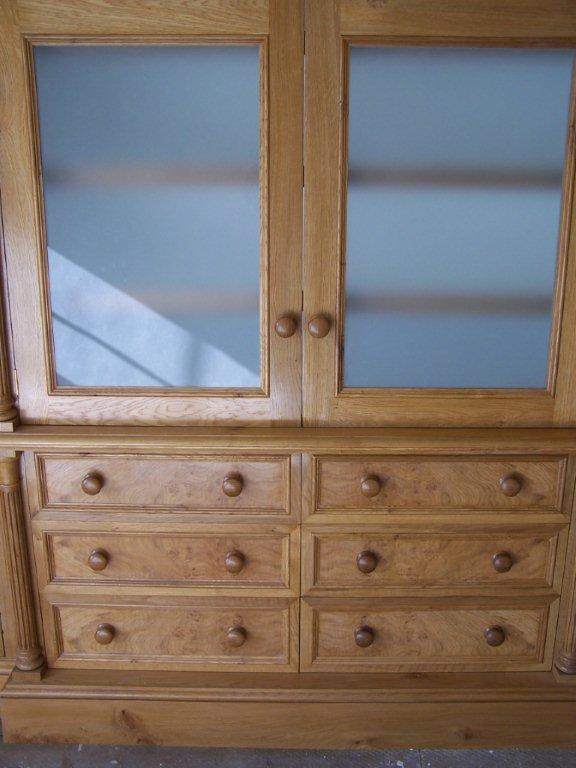 wooden cabinets with glass door