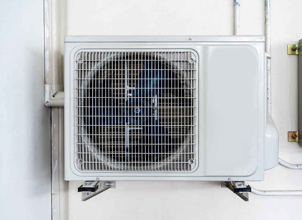 Heat Pump On Wall — Crossett, AR — Master Technicians & Mechanicals LLC
