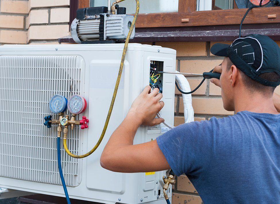 Technician Repairing HVAC — Crossett, AR — Master Technicians & Mechanicals LLC