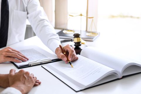Estate administration - Estate planning lawyer explaining documents to client in Evansville, IN Estate administration - Estate planning lawyer explaining documents to client in Evansville, IN