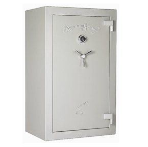 A white safe with a clock on it on a white background.
