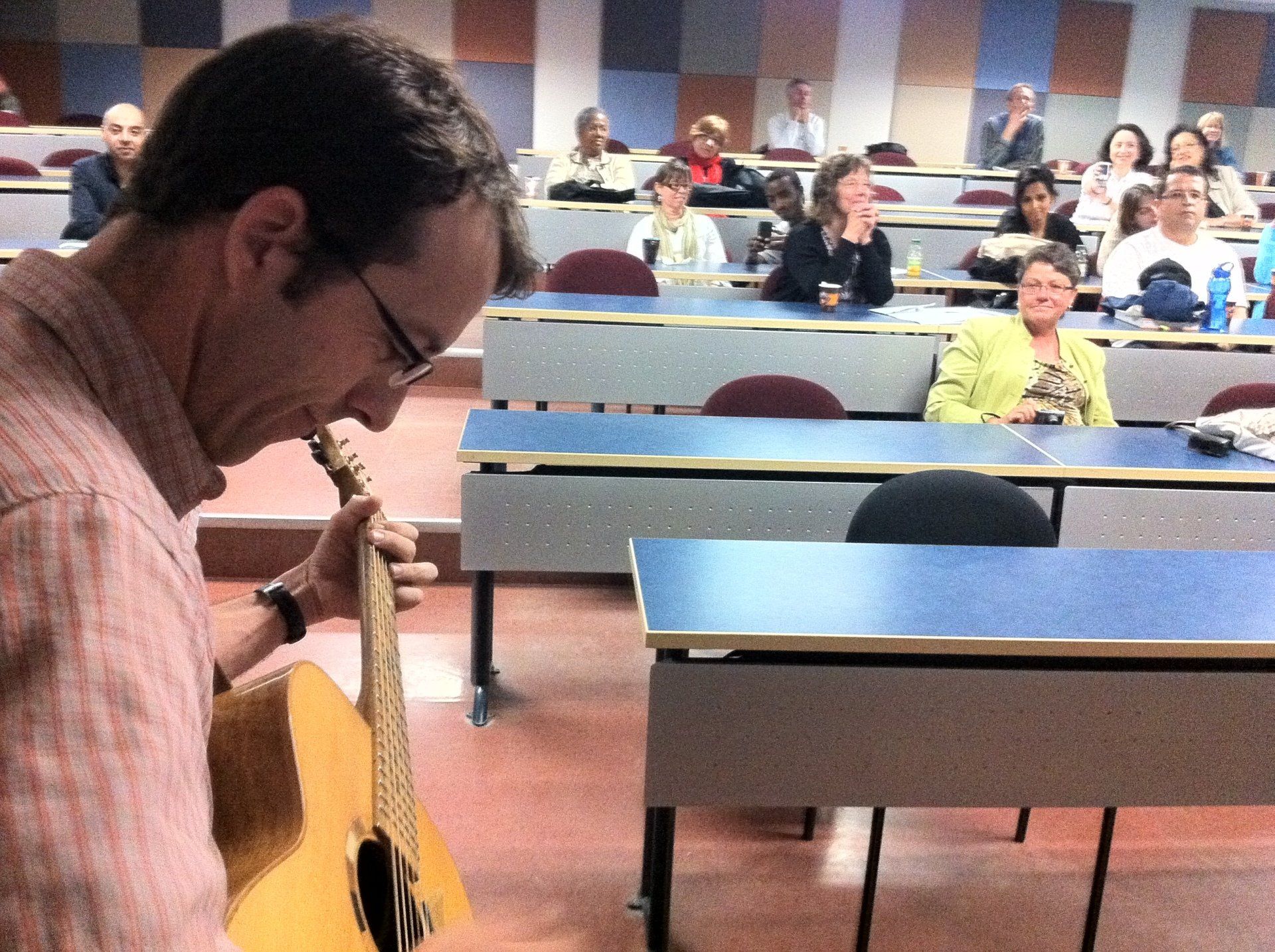 Teacher plays Voyageur for a small audience of fellow teachers at a Curriculum Forum at OISE in Toronto